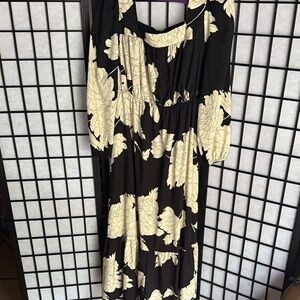 Elegant Black and Cream Floral Dress